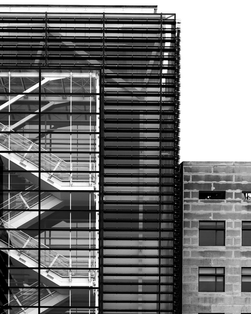 Glass curtain wall and steel sun-shading louvres on a modern building
