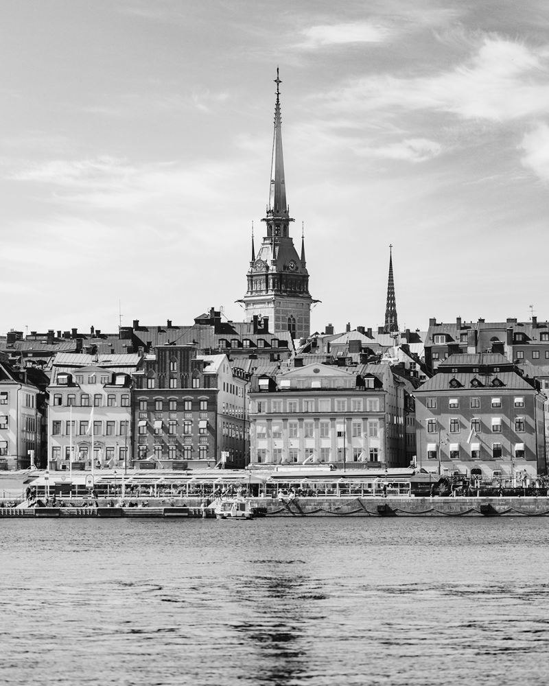 The spire of the German Church above the Gamla Stan waterfront in Stockholm